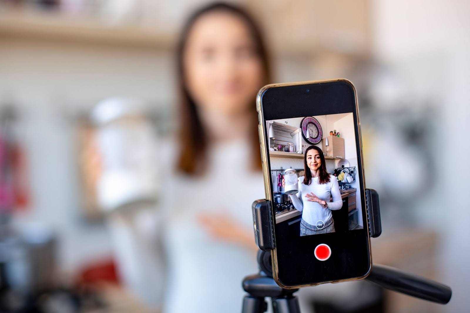 a woman recording an instagram reel